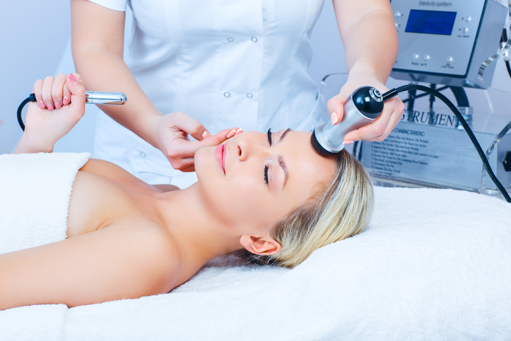 Woman receiving laser resurfacing treatment
